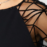 Bellezza | Černé šaty se síťovanými rukávy a volným střihem